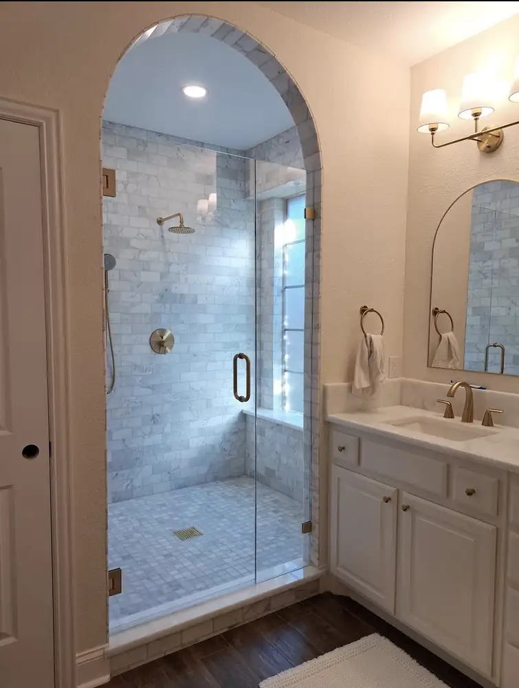 Arched marble shower remodel