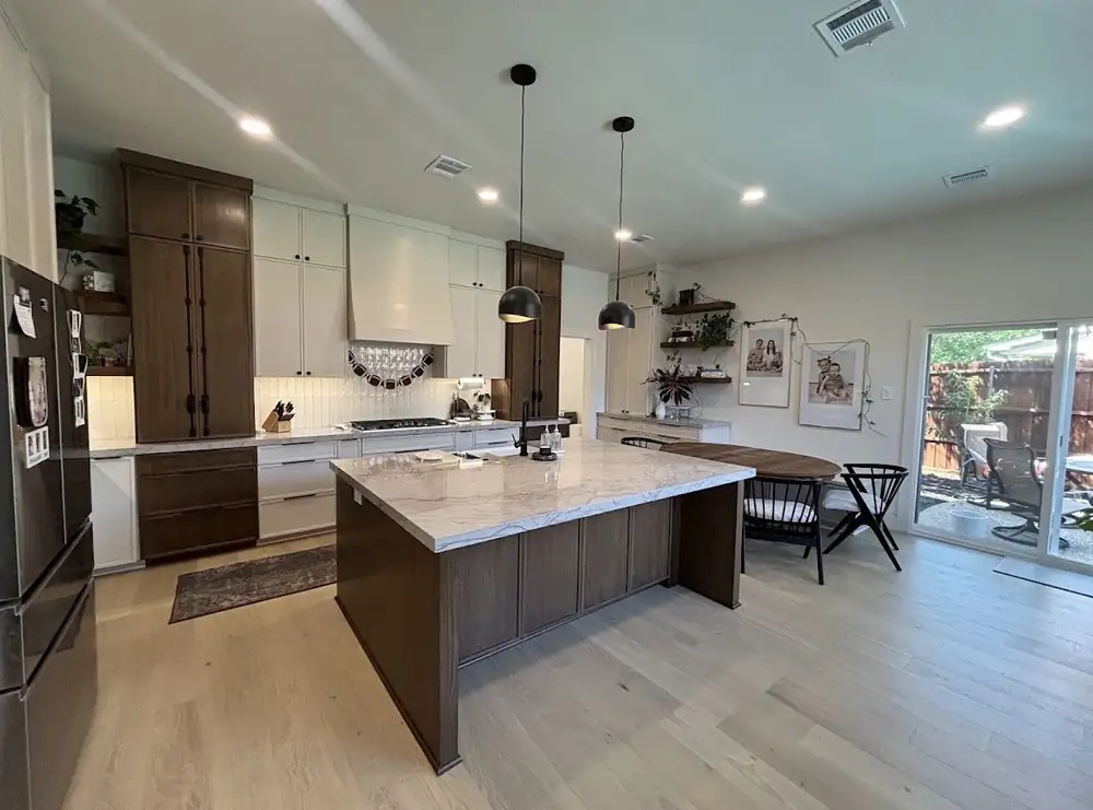 Modern kitchen with dark wood island